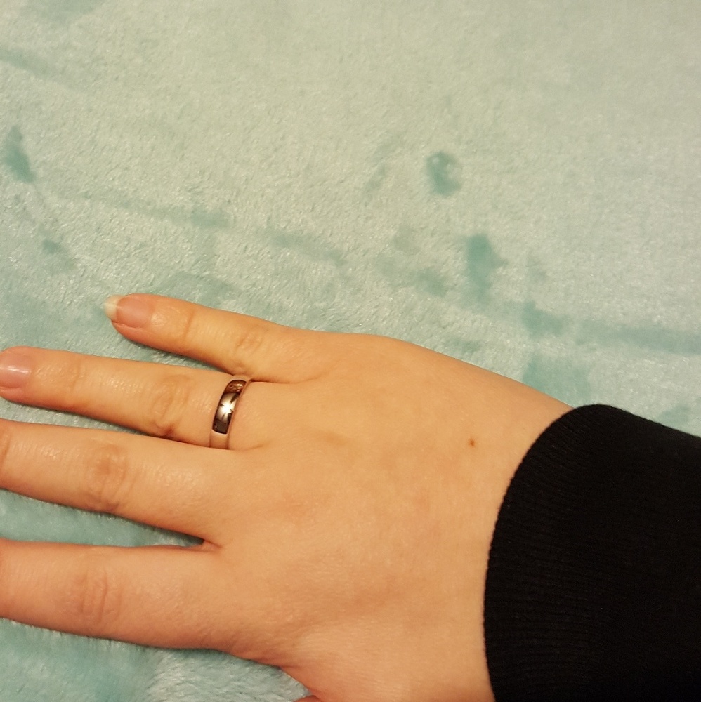 Sterling silver stamped 4mm band size 7